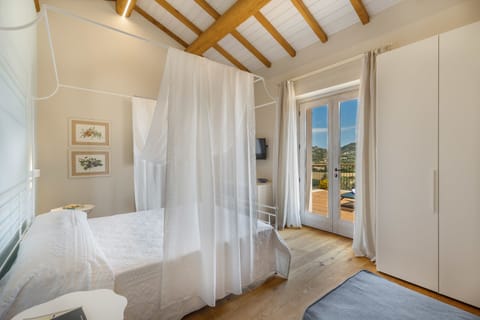 Triple Room, Vineyard View | Premium bedding, in-room safe, individually decorated, desk