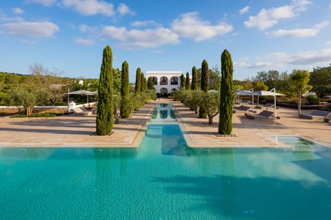 Outdoor pool, pool umbrellas, sun loungers