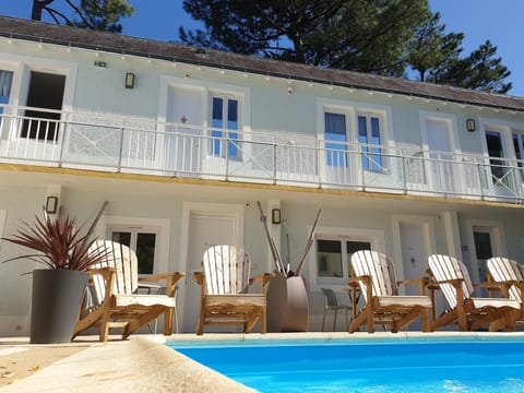Outdoor pool, open 11:00 AM to 7:00 PM, sun loungers