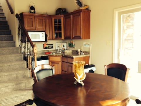 Lower level bar and gaming table.  Table converts to poker table and bumper pool