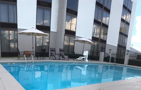 Seasonal outdoor pool, open 10:00 AM to 9:00 PM, sun loungers