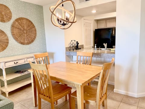 The dining table seats 4 comfortably