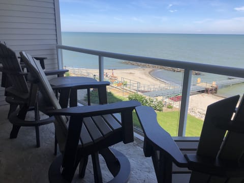 Patio with four captain chairs with perfect view over the railing. 


440-479-45