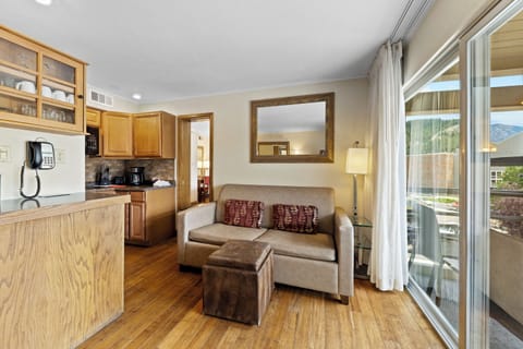 Suite, 3 Bedrooms | Living area | 30-inch flat-screen TV with cable channels, TV, table tennis