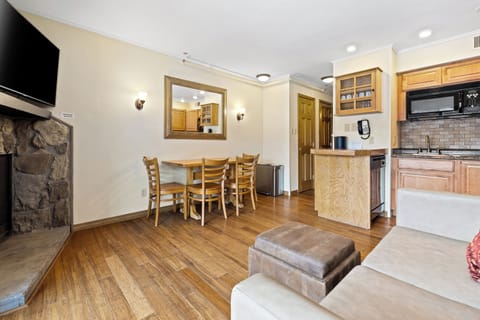 Suite, 1 Bedroom | Living area | 30-inch flat-screen TV with cable channels, TV, table tennis