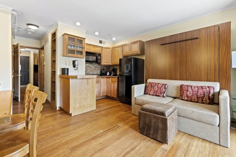 Suite, 1 Bedroom | Living area | 30-inch flat-screen TV with cable channels, TV, table tennis