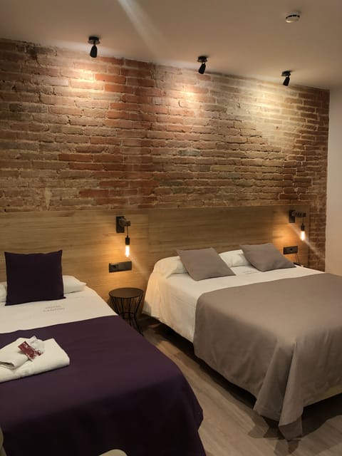 Superior Family Triple Room, Multiple Beds | Minibar, in-room safe, blackout drapes, soundproofing