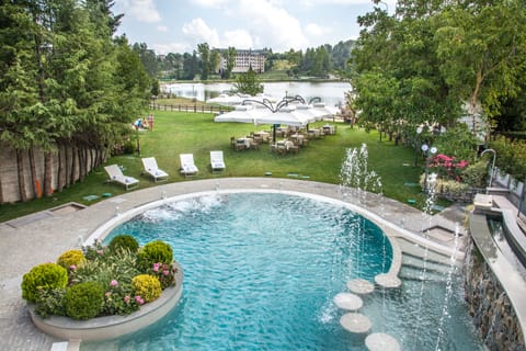 Indoor pool, outdoor pool, open 9:00 AM to 7:00 PM, sun loungers