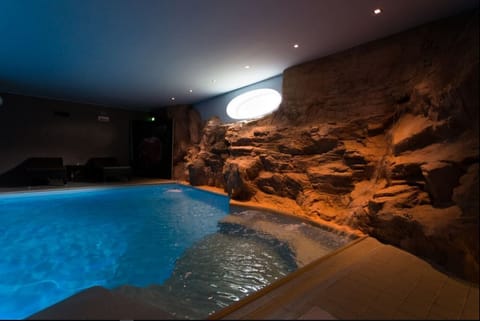 Indoor pool, open 1:00 PM to 9:00 PM, sun loungers