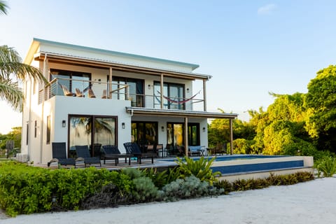 Wall of Windows that opens to the Caribbean Sea with magnificent ocean views!