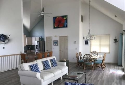 Large open living area with cathedral ceilings and awesome views.