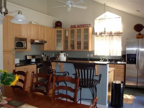 Kitchen Furnished with the Chef in Mind and 5 Burner Gas Range