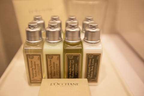 Designer toiletries, hair dryer, bathrobes, slippers