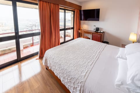 Standard Double Room, 1 Queen Bed | Minibar, in-room safe, individually decorated, desk