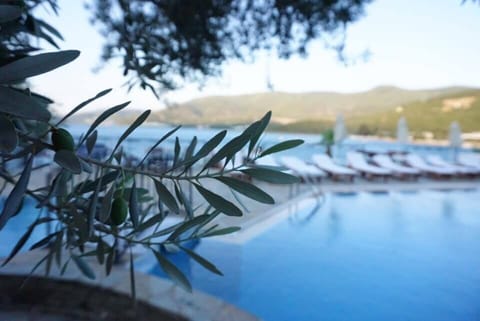 Outdoor pool, pool umbrellas, sun loungers