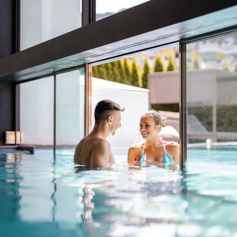 Indoor pool, outdoor pool, pool umbrellas, sun loungers