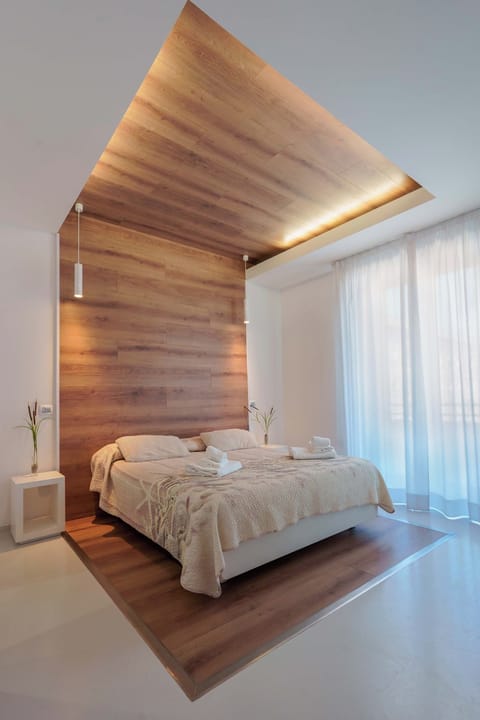 Premium bedding, down comforters, memory foam beds, desk