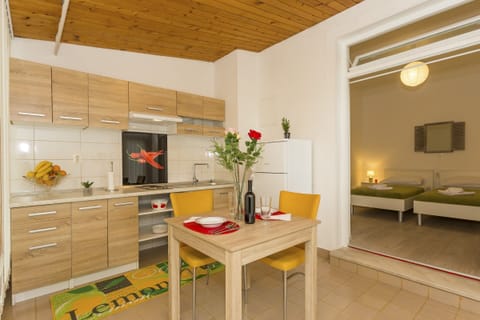 Kitchen, dining area and bedroom area
