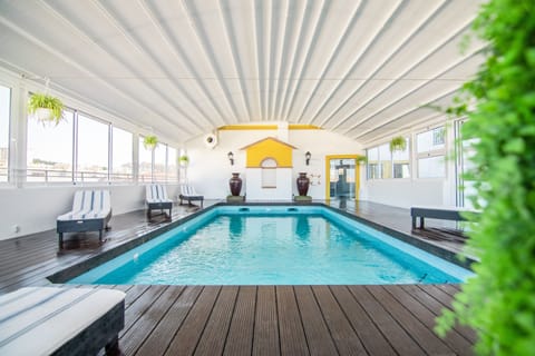 Outdoor pool, open 8 AM to 8 PM, sun loungers