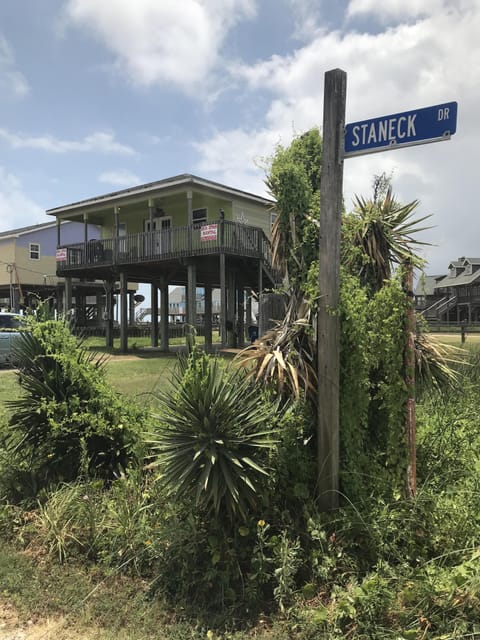 house corner lot with large grass area