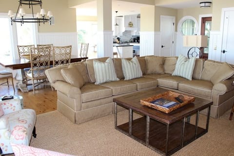 The great room opens into the dining area and kitchen.