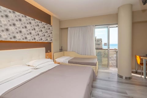 Triple Room, Sea View | In-room safe, desk, blackout drapes, free WiFi
