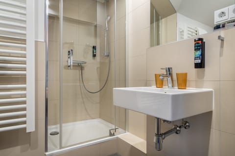 Shower, free toiletries, hair dryer, towels