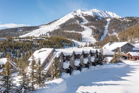 View of Saddle Ridge A building with Lone Peak & ski slopes in the background