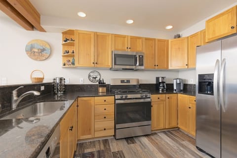 Beautiful kitchen with stainless appliances & all of your cooking needs.