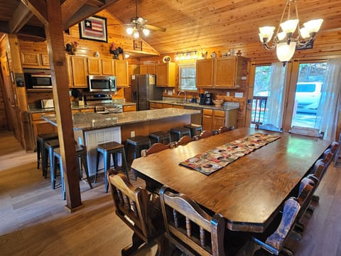 Spacious open kitchen with large granite Island, plenty of seating