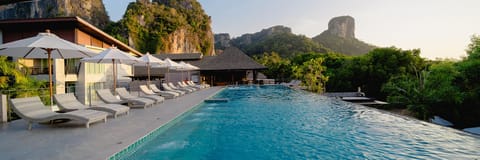 Indoor pool, outdoor pool, open 7:00 AM to 7:00 PM, sun loungers