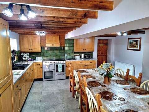 Cottage | Private kitchen | Stovetop, dishwasher, highchair, cookware/dishes/utensils