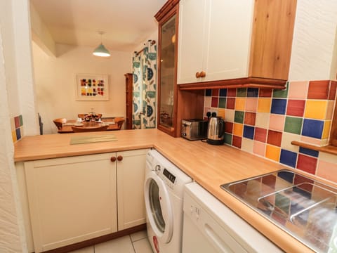 Cottage | Private kitchen | Stovetop, dishwasher, highchair, cookware/dishes/utensils