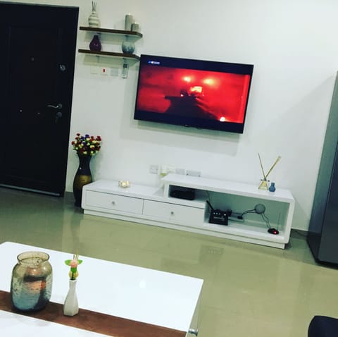 Classic Apartment, 1 Bedroom | Living room | Flat-screen TV