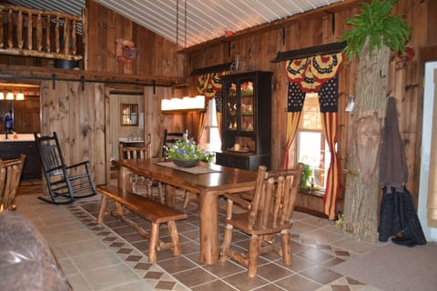 Dining Room featuring new aspen log furniture and heated floors