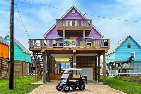 Front view of house. Ask about our low rates for the golf cart.
