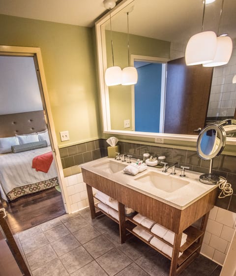 Suite, 1 King Bed, Balcony | Bathroom | Shower, hydromassage showerhead, designer toiletries, hair dryer