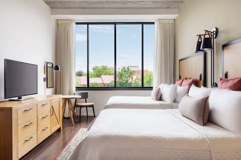 Hypo-allergenic bedding, in-room safe, desk, laptop workspace