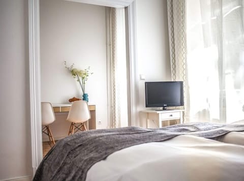 Suite, Private Bathroom | Down comforters, individually decorated, individually furnished, desk
