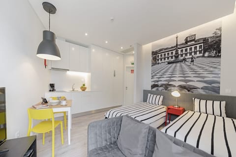 Livingroom , dining area , kitchen and Bedroom with two single beds. 