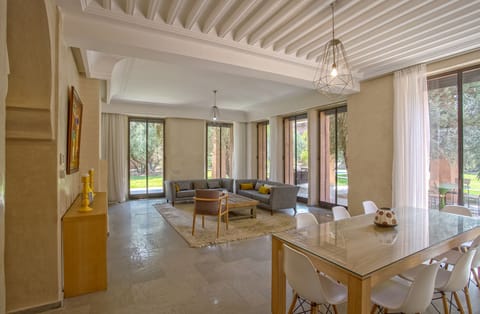 Luxury Villa (4 Suites Luxe) | Living room | 42-inch flat-screen TV with cable channels, TV
