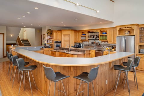 Bar side seating for eight at one of two breakfast bars