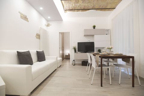 Apartment, 1 Bedroom | Living area | Flat-screen TV