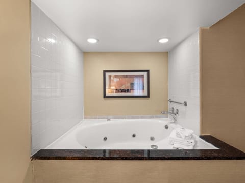 Premium bedding, laptop workspace, blackout drapes, iron/ironing board