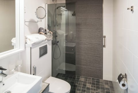 Shower, hair dryer, bathrobes, towels