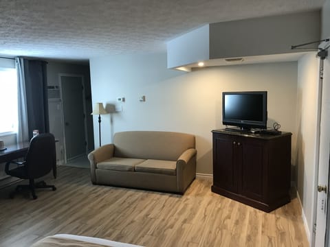 Standard Suite, Multiple Beds | Living area | 40-inch flat-screen TV with digital channels, Netflix