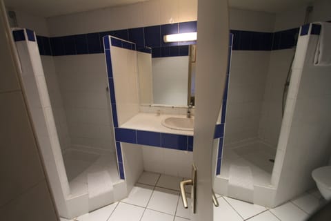 Double Room | Bathroom | Shower, free toiletries, towels