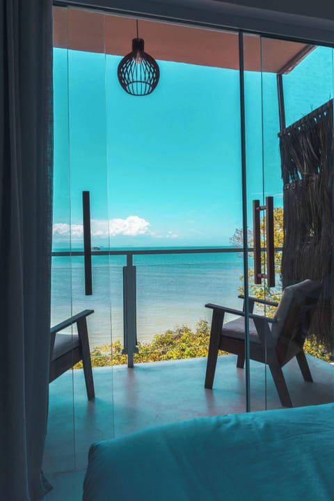 Deluxe Double Room, Jetted Tub, Sea View | Minibar, individually decorated, blackout drapes, iron/ironing board