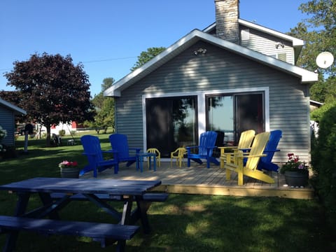Relax on the deck with a view of the lake.