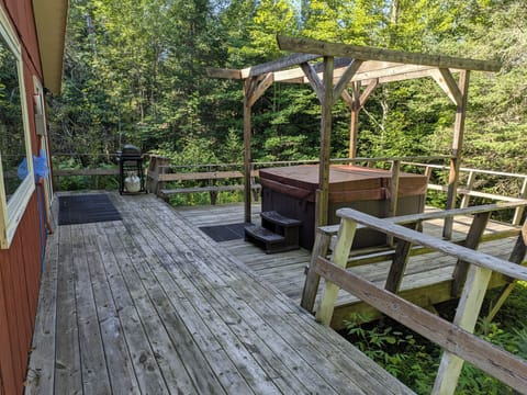 Another view of private back deck with hot tub